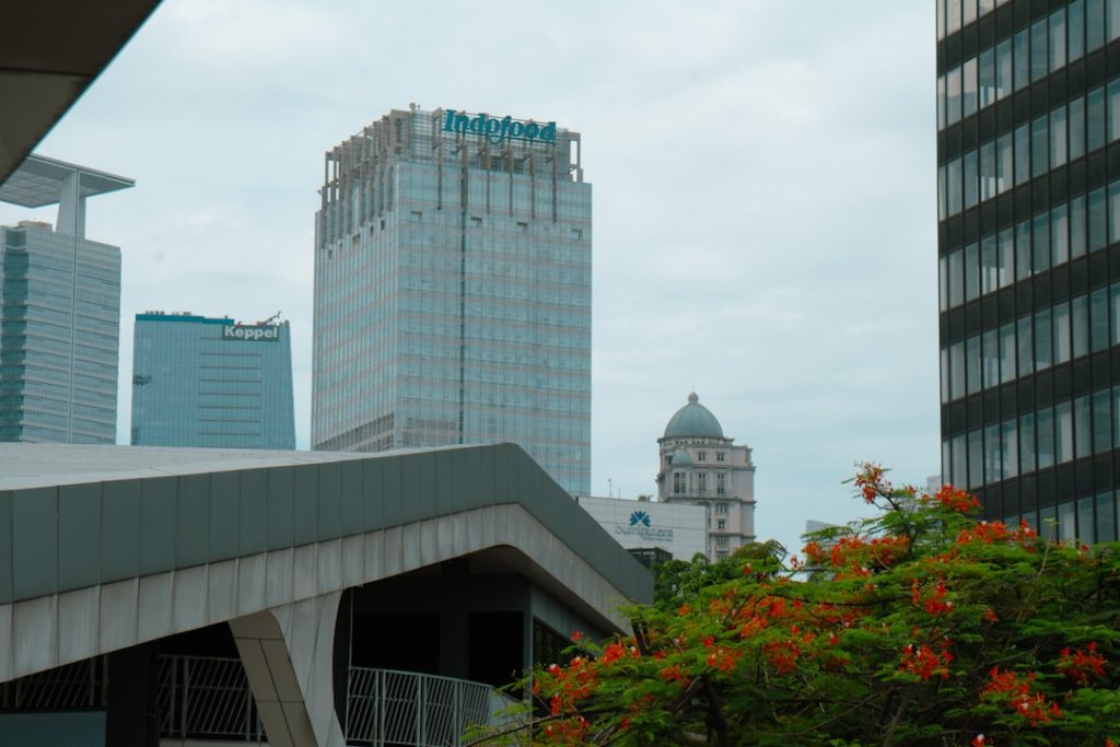 A view of a city with tall buildings in the background