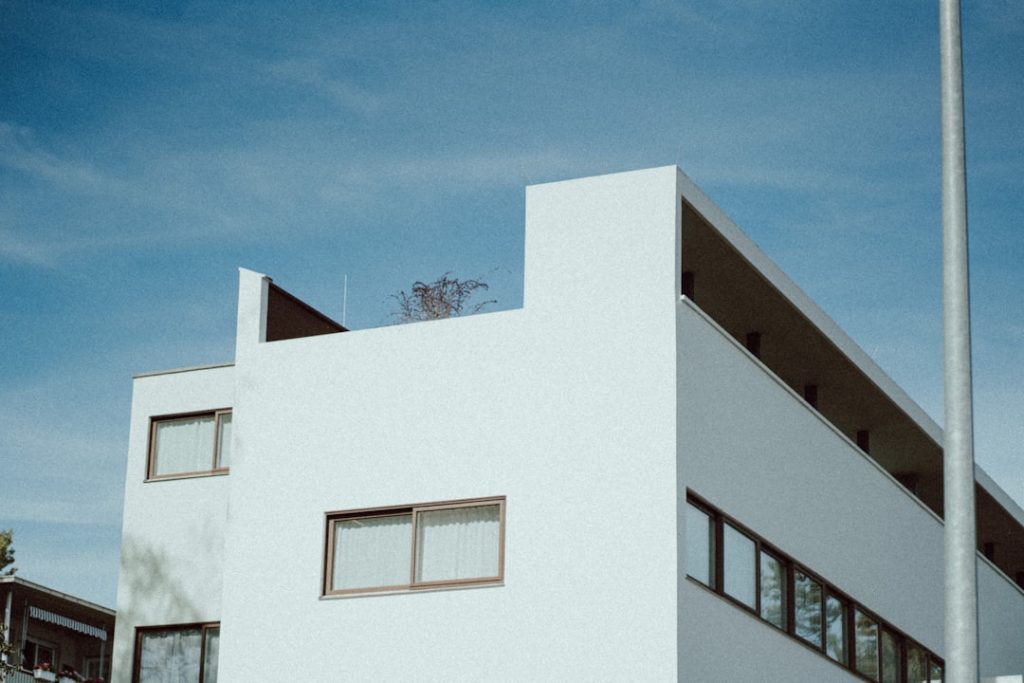a white building with a blue sky