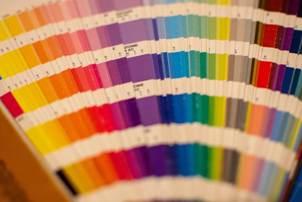 a close up of a pan of color samples