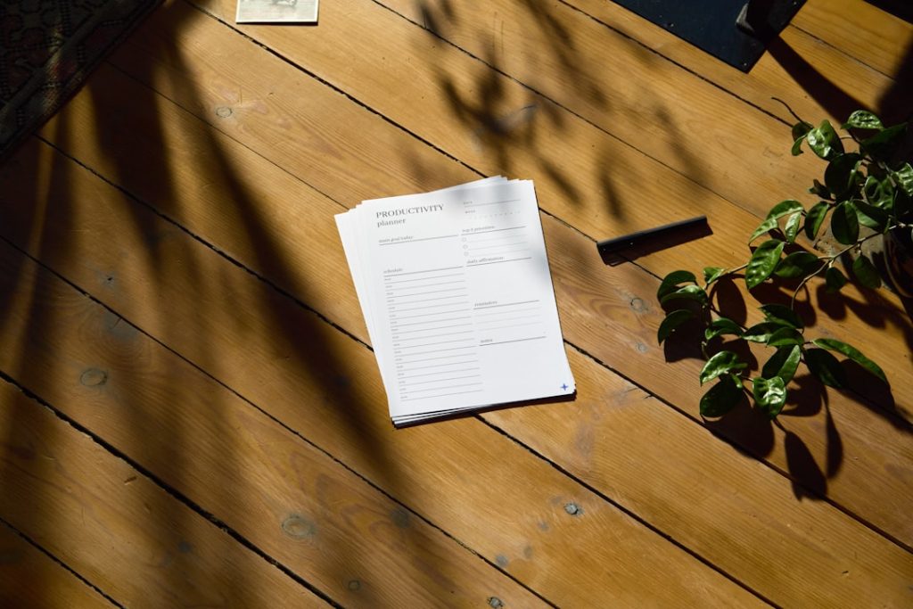 a piece of paper sitting on top of a wooden table